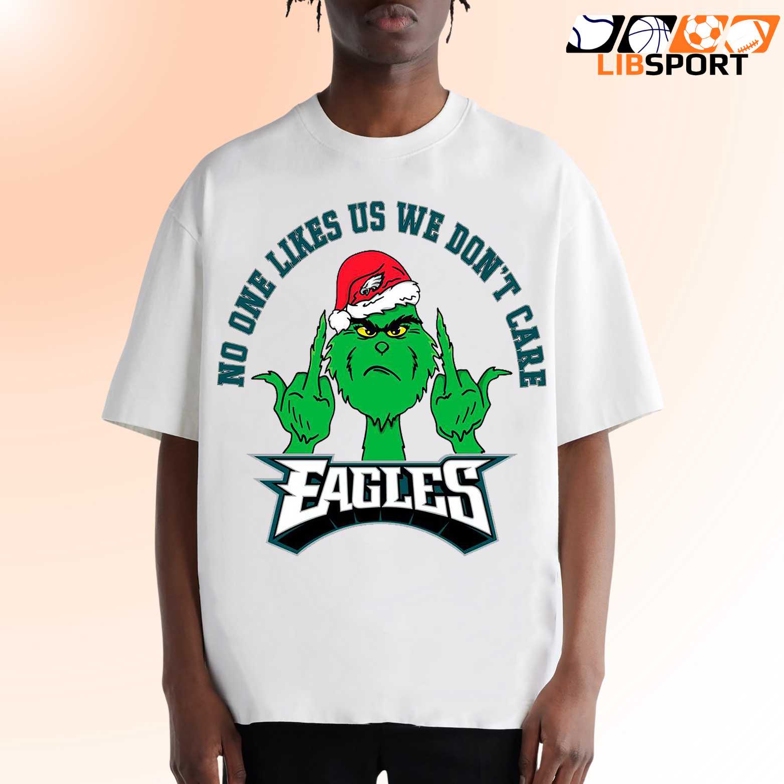 Philadelphia Eagles Grinch Middle Finger T-Shirt, No One Likes Us We Don’t Care Tee, Funny Holiday Fan Gift